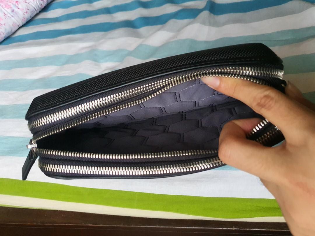 Clutch tumi original deals