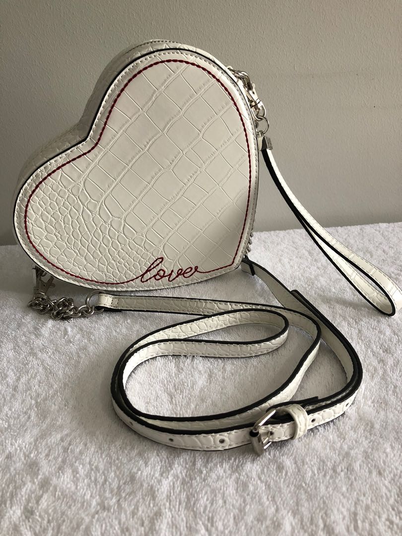 Aldo parrawe heart shaped white sling bag