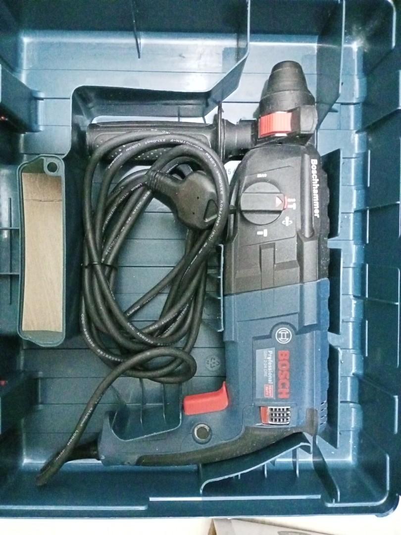 Bosch Gbh 2 24 Dre 2kg Rotary Hammer Drill 3 Mode Drilling Hacking And Chiseling Home Services Others On Carousell