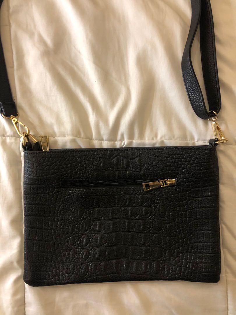 Faux croc skin sling bag (Category: Cross-body Bags) located in Manila. Submitted by ibdecluttering (Listing ID 1055803274, Image 1). Description: .