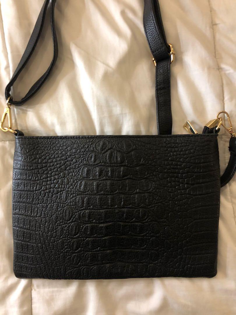 Faux croc skin sling bag (Category: Cross-body Bags) located in Manila. Submitted by ibdecluttering (Listing ID 1055803274, Image 2). Description: .
