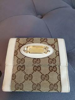 Gucci Monogram Leather Tri-Fold Wallet