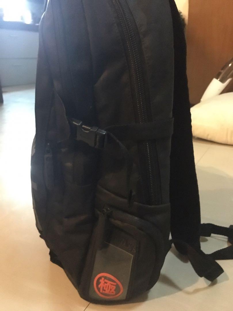 Superdry black backpack (Category: Backpacks) located in Muntinlupa City. Submitted by phrque (Listing ID 1055785585, Image 2). Description: With minimal scratches. Not visible. With lots of compartments. Good for traveling. .