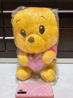 Winnie the Pooh with heart plush toy