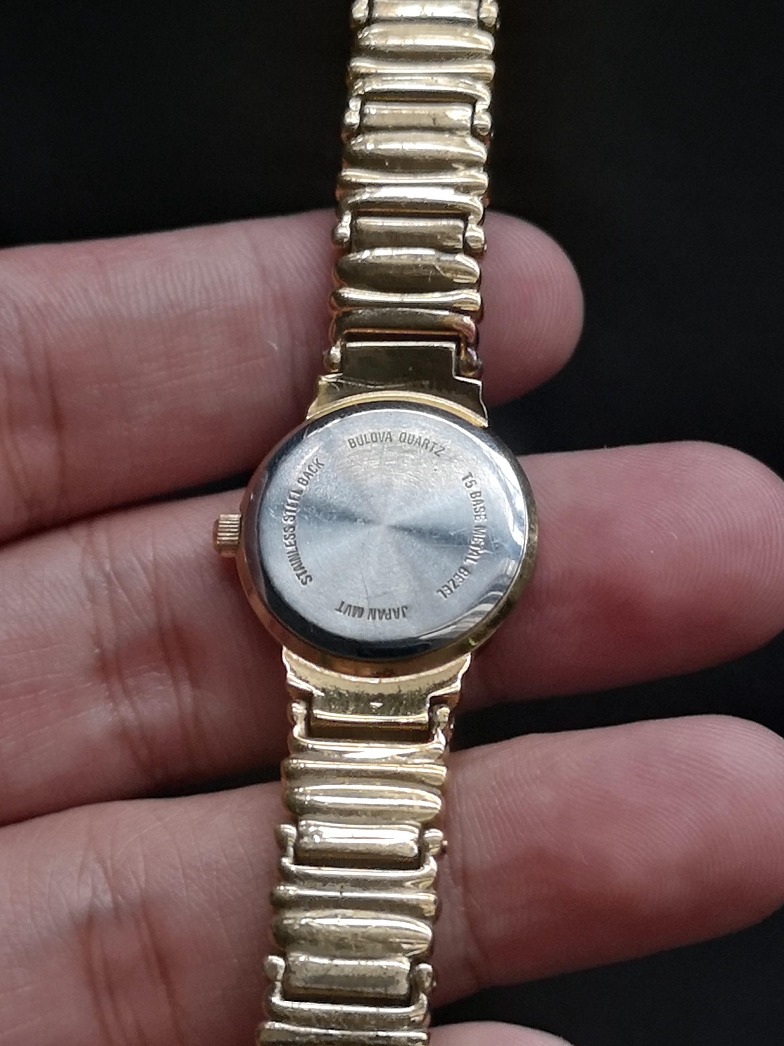 Bulova quartz t5 best sale base metal bezel