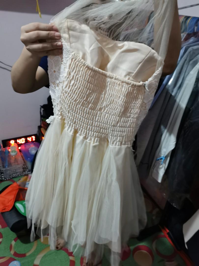 Cute Peach Short Dress (Category: Dresses) located in Quezon City. Submitted by professional.declutterer (Listing ID 1056124864, Image 3). Description: Cute Peach Short Dress - Used once only for photoshoot - small MOP: BDO/BPI/Gcash/Paymaya Location: Roosevelt QC RFS: decluterring and for baby's vaccines.