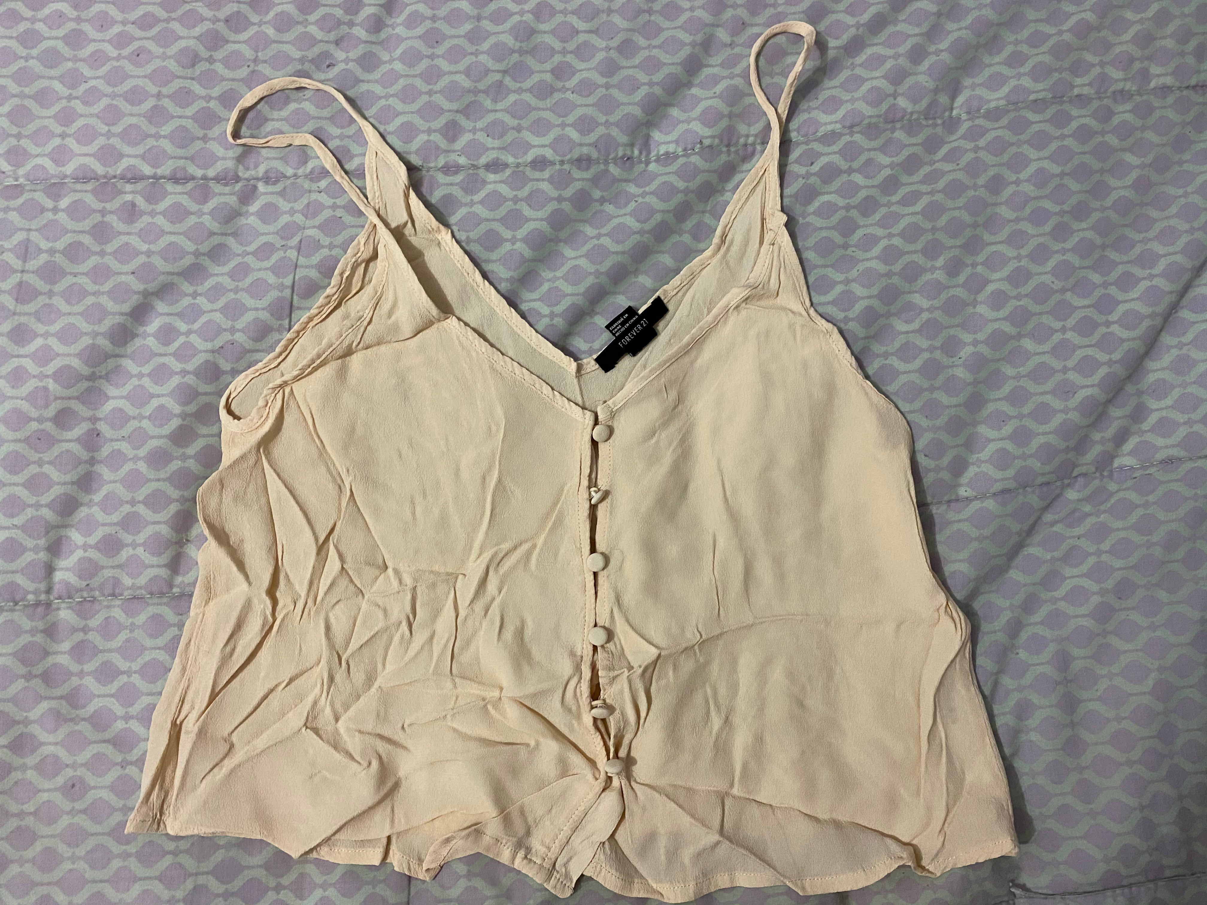 Forever 21 Crepe Sleeveless Top (Category: Sleeveless) located in Makati City. Submitted by chicky_nini (Listing ID 1056125870, Image 1). Description: Last price indicated on listing Fits M.