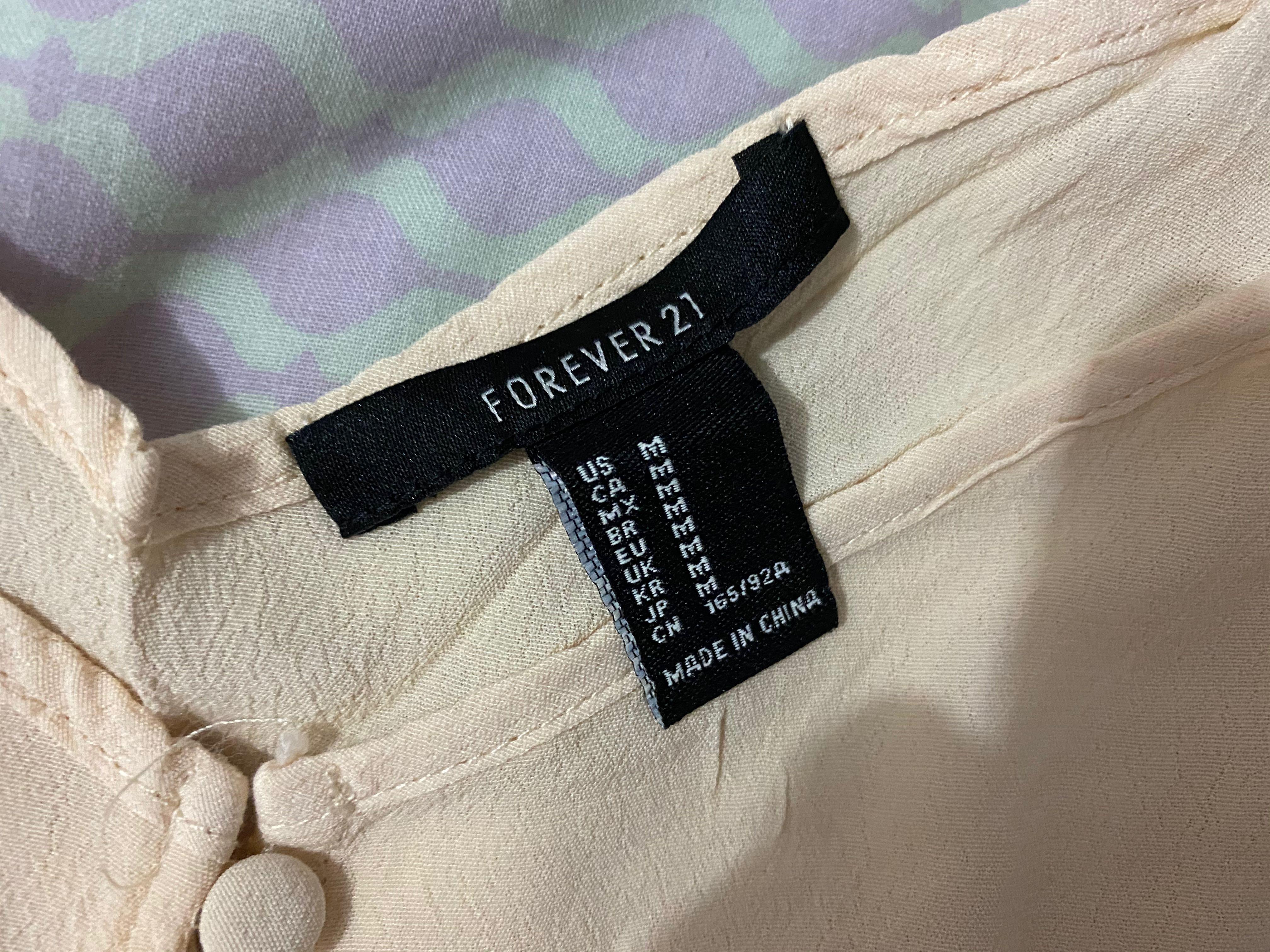 Forever 21 Crepe Sleeveless Top (Category: Sleeveless) located in Makati City. Submitted by chicky_nini (Listing ID 1056125870, Image 2). Description: Last price indicated on listing Fits M.