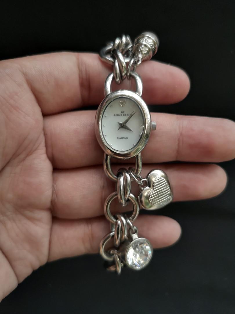 Anne Klein | Accessories | Anne Klein Women Goldtone Charm Bracelet Watch |  Poshmark