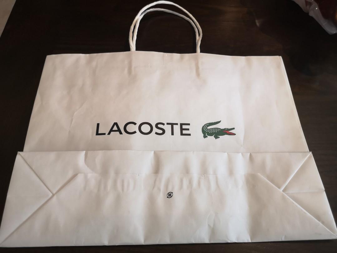 Lacoste paper bag (Category: Luxury Bags & Wallets) located in San Juan City. Submitted by super.saver8 (Listing ID 1056181461, Image 2). Description: .