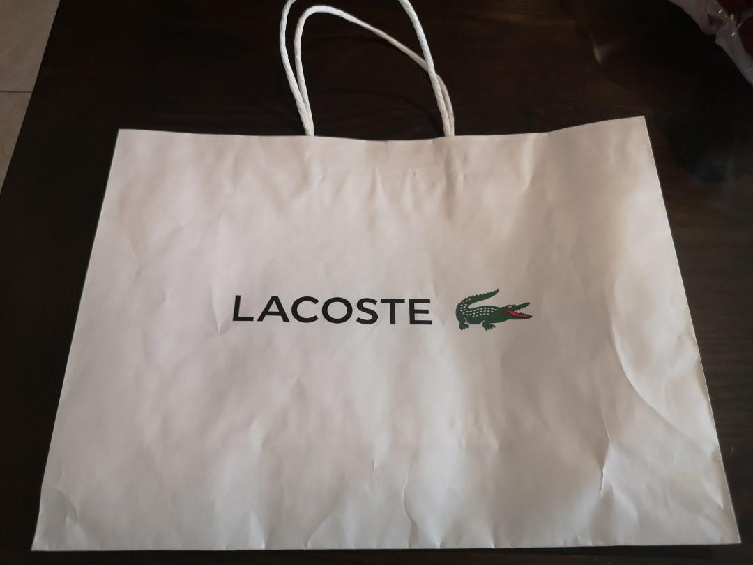 Lacoste paper bag (Category: Luxury Bags & Wallets) located in San Juan City. Submitted by super.saver8 (Listing ID 1056181461, Image 1). Description: .
