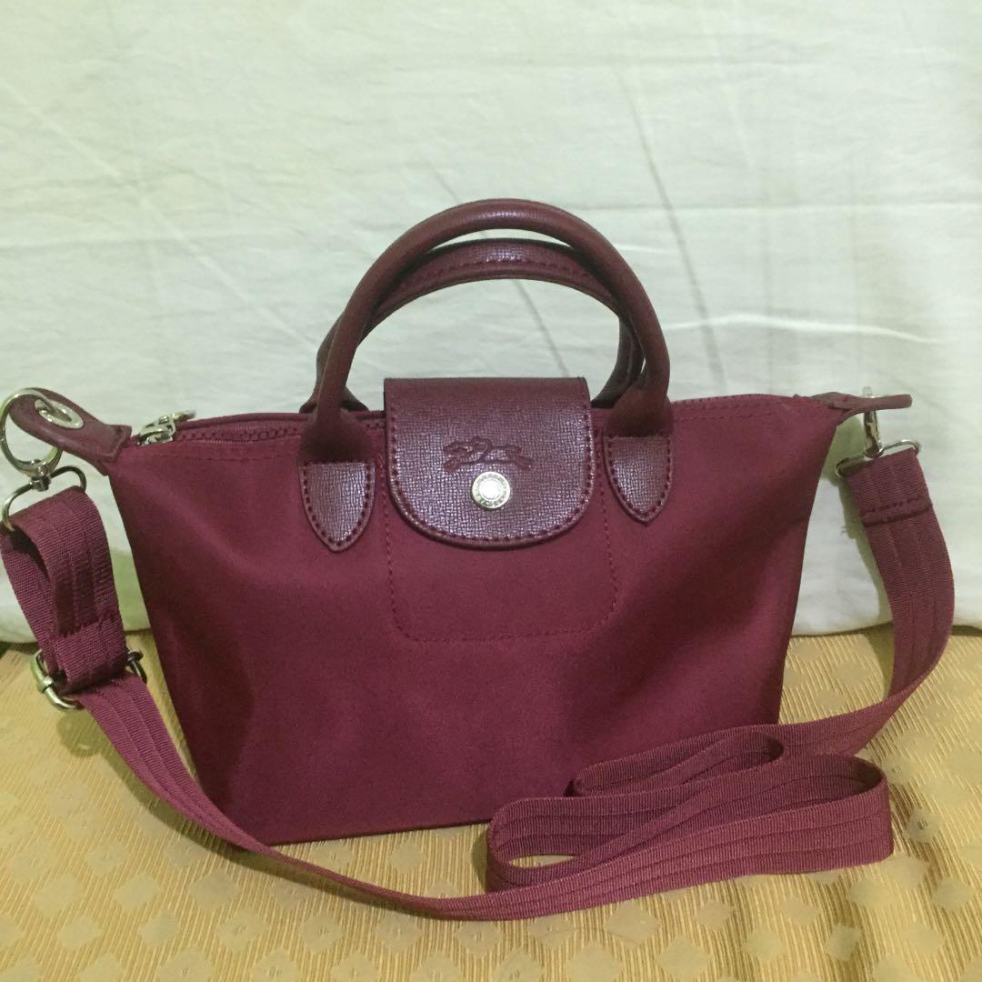 Longchamp Pouch with Handle & Sling (When Worn), Women's Fashion, Bags &  Wallets, Cross-body Bags on Carousell