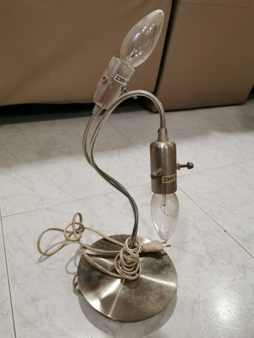 Table Lamp (Category: Lighting) located in Singapore. Submitted by haveateetree (Listing ID 1056312739, Image 1). Description: Working. Missing its caps.