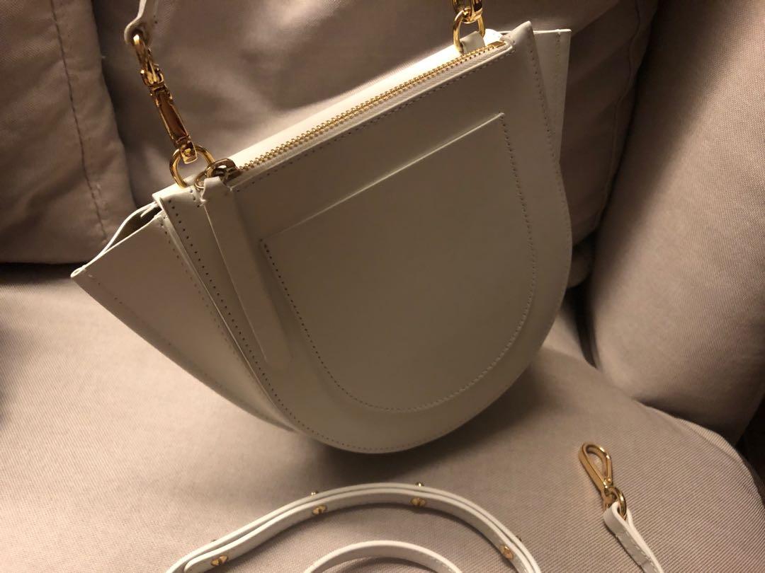 Wandler Mini Hortensia Bag (Category: Luxury Bags & Wallets) located in Mandaluyong City. Submitted by declutteringacct (Listing ID 1056359581, Image 3). Description: Hard to find color (white) Practically brandnew Creasing on the pull tab is normal ‘cause of the material With short and long strap, card, and dustbag.