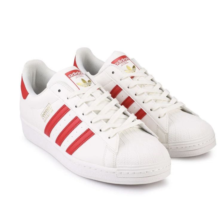 Red and outlet white adidas sneakers