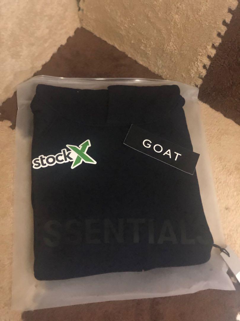 fear of god essentials hoodie ssense