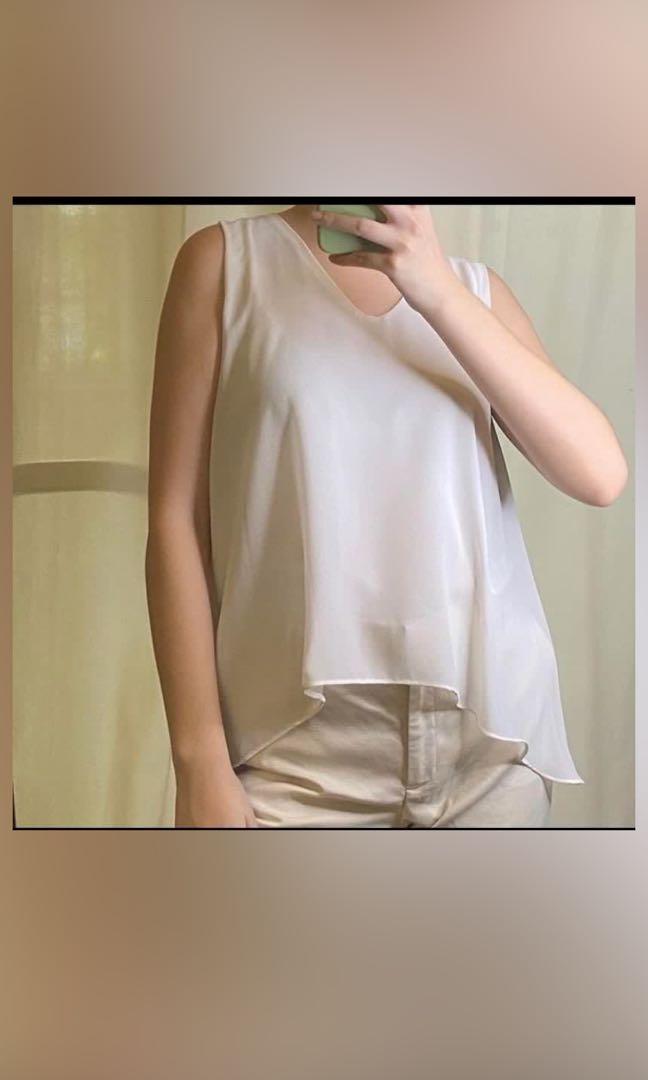 white blouse with flowy sleeves