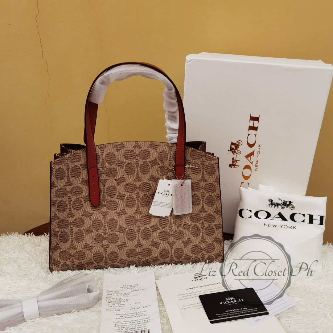 Coach charlie carryall 28 hot sale signature