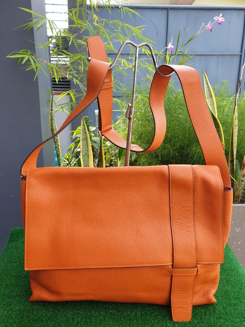 Orange messenger best sale bag