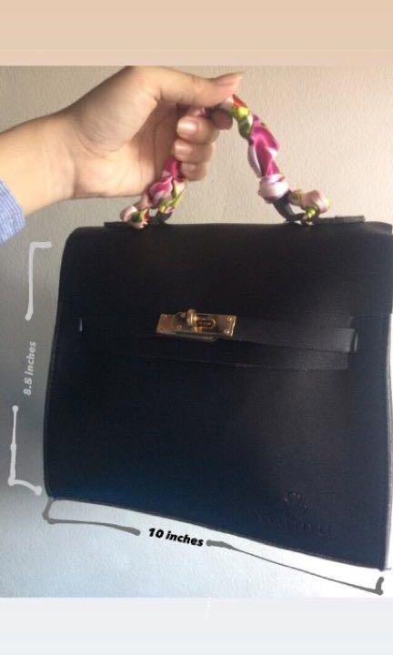 Small Lock Sling Bag with free twilly (Category: Luxury Bags & Wallets) located in Manila. Submitted by officialtheia (Listing ID 1056463366, Image 2). Description: Small Lock Sling Bag with free twilly Color:Black Once used W10 inches L8.5 inches Good Condition like brandnew.
