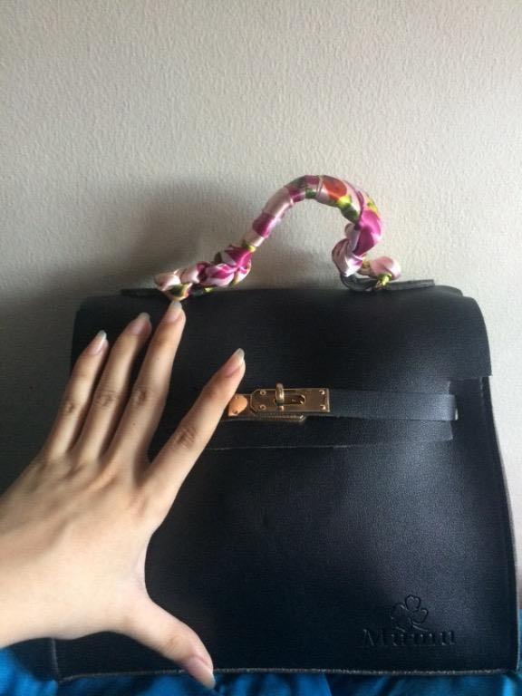 Small Lock Sling Bag with free twilly (Category: Luxury Bags & Wallets) located in Manila. Submitted by officialtheia (Listing ID 1056463366, Image 3). Description: Small Lock Sling Bag with free twilly Color:Black Once used W10 inches L8.5 inches Good Condition like brandnew.