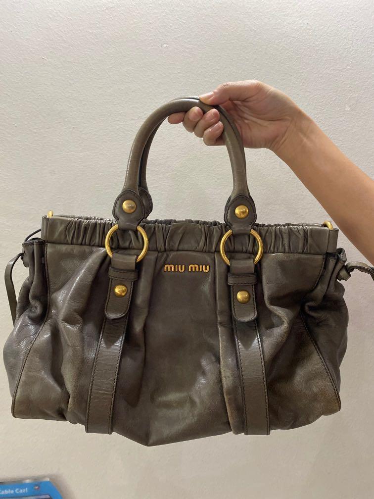 Authentic Miu Miu Bag (Category: Bags & Wallets) located in Singapore. Submitted by gine16 (Listing ID 1056667053, Image 1). Description: General wear and tear. Bring it to bag spa to give it a new life. .