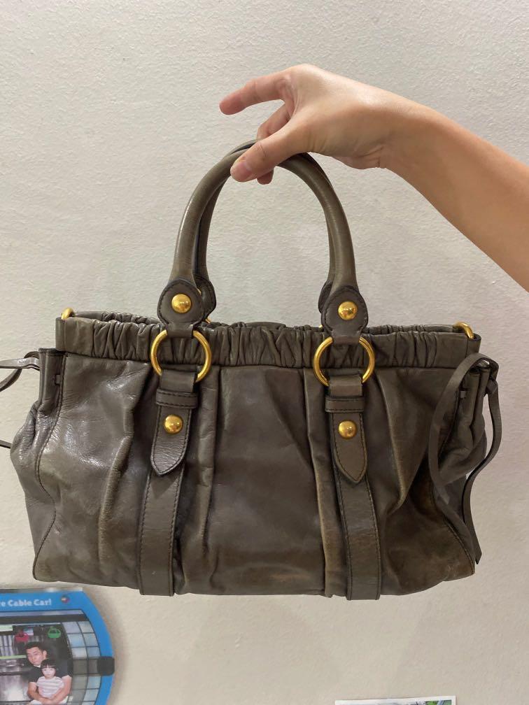 Authentic Miu Miu Bag (Category: Bags & Wallets) located in Singapore. Submitted by gine16 (Listing ID 1056667053, Image 2). Description: General wear and tear. Bring it to bag spa to give it a new life. .