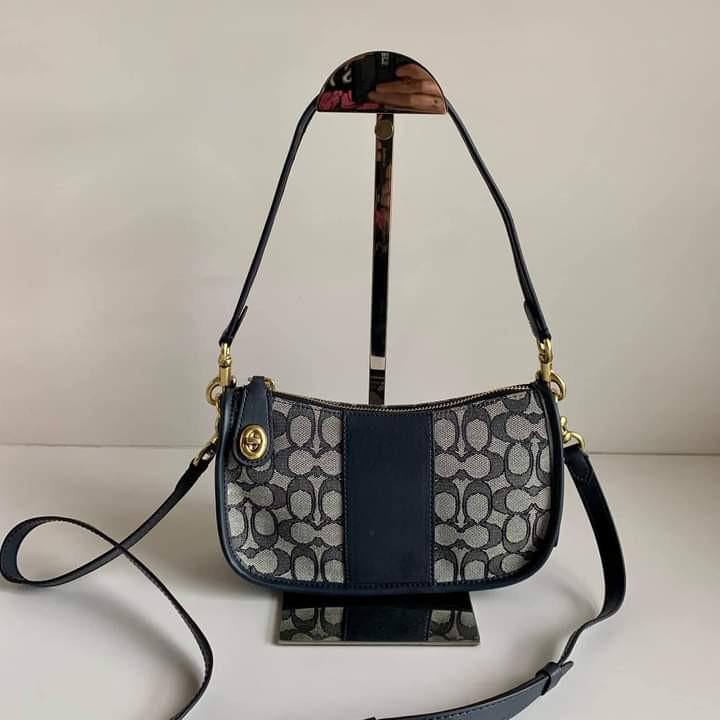 Swinger bag hotsell in signature jacquard