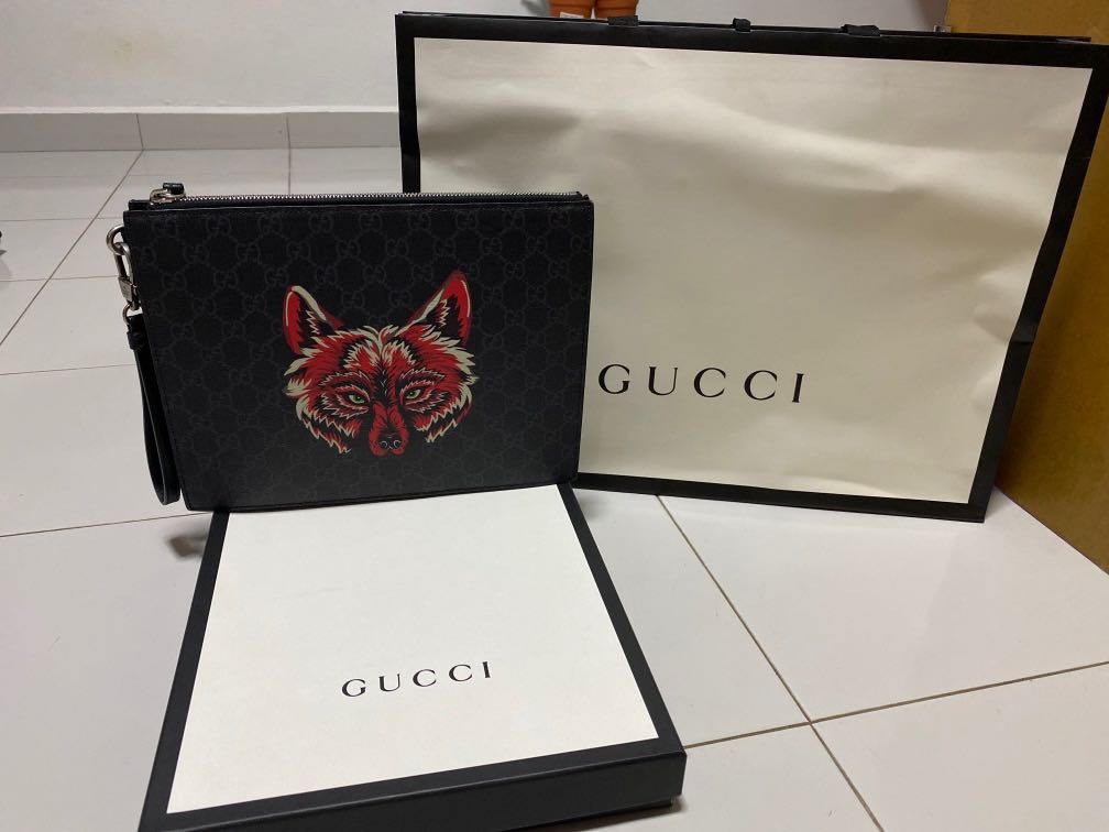 Gucci Supreme Wolf Clutch, Luxury, Bags & Wallets on Carousell