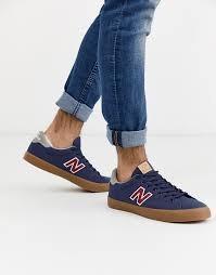 new balance 210 trainers in white with gum sole