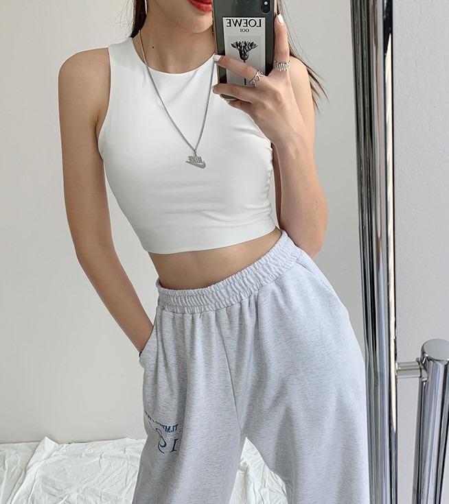 [INSTOCK] Basic Crop Top (Category: Sleeveless) located in Singapore. Submitted by bubsandmums (Listing ID 1053235254, Image 5). Description: INSTOCK S - Bust: 69+cm / Waist: 58+cm / Length: 35cm M - Bust: 73+cm / Waist: 62+cm / Length: 36cm Material: Polyester Blend Package Content: 1 PC Stretchable Measurement Accuracy : Measurements could have discrepancies of +/- 1 - 3cm. Please note that there could be slight differences in the colour tone o