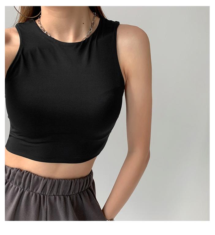 [INSTOCK] Basic Crop Top (Category: Sleeveless) located in Singapore. Submitted by bubsandmums (Listing ID 1053235254, Image 2). Description: INSTOCK S - Bust: 69+cm / Waist: 58+cm / Length: 35cm M - Bust: 73+cm / Waist: 62+cm / Length: 36cm Material: Polyester Blend Package Content: 1 PC Stretchable Measurement Accuracy : Measurements could have discrepancies of +/- 1 - 3cm. Please note that there could be slight differences in the colour tone o