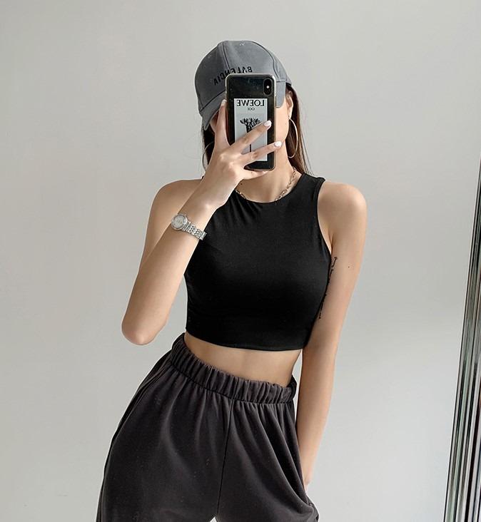 [INSTOCK] Basic Crop Top (Category: Sleeveless) located in Singapore. Submitted by bubsandmums (Listing ID 1053235254, Image 7). Description: INSTOCK S - Bust: 69+cm / Waist: 58+cm / Length: 35cm M - Bust: 73+cm / Waist: 62+cm / Length: 36cm Material: Polyester Blend Package Content: 1 PC Stretchable Measurement Accuracy : Measurements could have discrepancies of +/- 1 - 3cm. Please note that there could be slight differences in the colour tone o