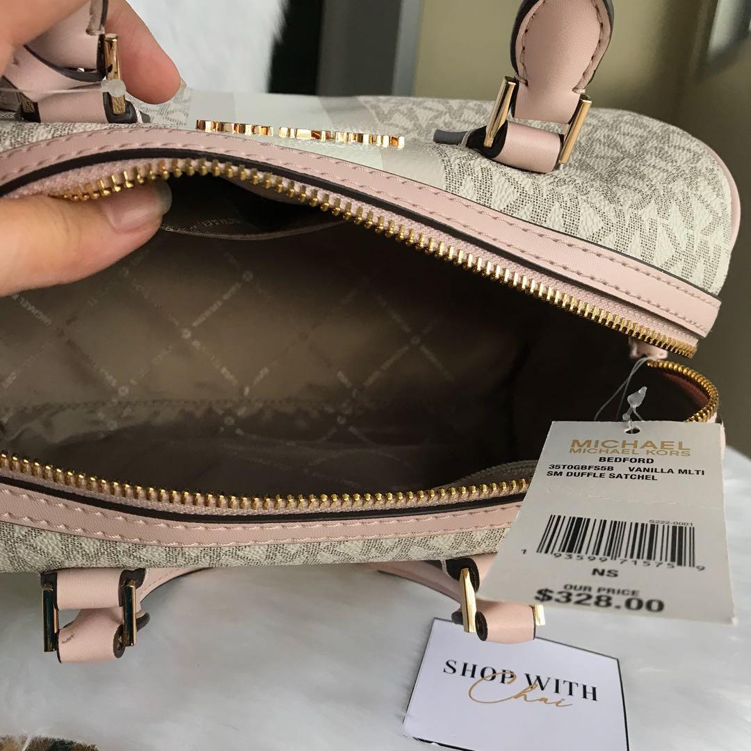 Michael Kors Duffle Bag in Mono Pink, Luxury, Bags & Wallets on Carousell
