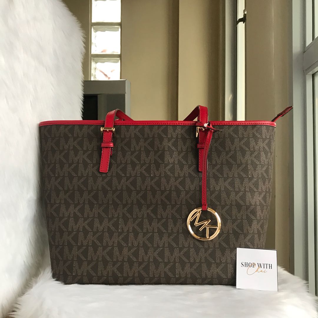 Michael Kors Tote in Brown Monogram Red Lining, Luxury, Bags & Wallets on  Carousell