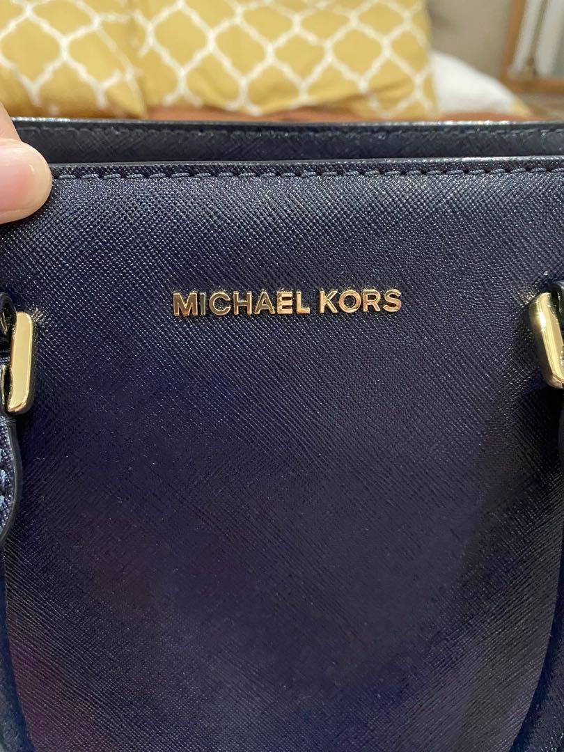 MK Bag (Category: Luxury Bags & Wallets) located in Quezon City. Submitted by made_byxx (Listing ID 1053208935, Image 2). Description: Authentic Black MK bag‼️ Never used With dust bag and strap Bought at US.