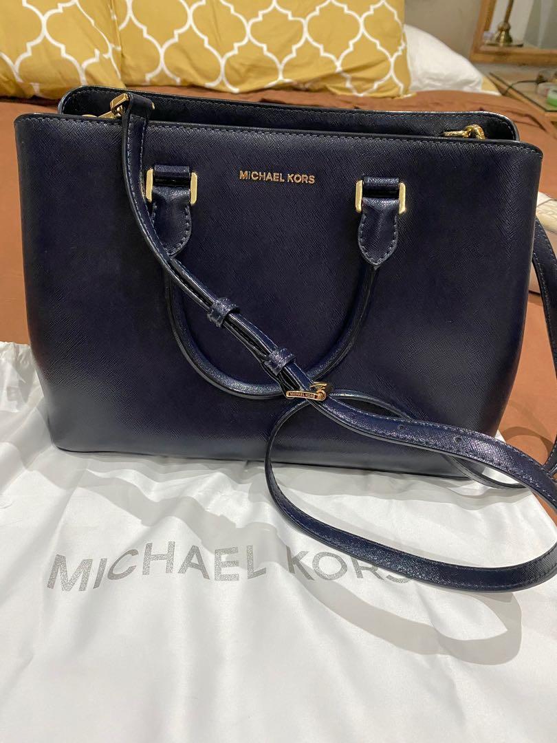 MK Bag (Category: Luxury Bags & Wallets) located in Quezon City. Submitted by made_byxx (Listing ID 1053208935, Image 1). Description: Authentic Black MK bag‼️ Never used With dust bag and strap Bought at US.
