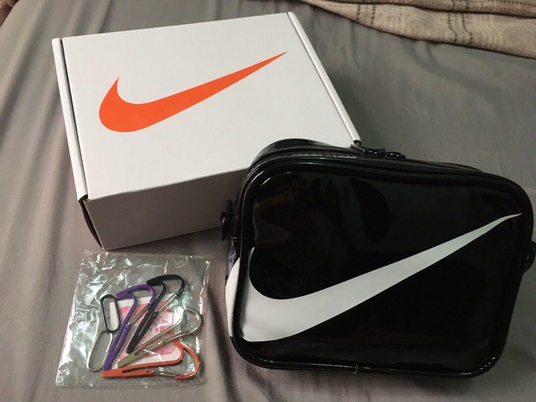 Nike mini swoosh sling bag deals