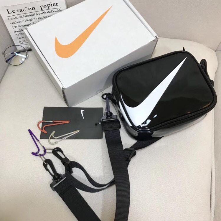 Nike mini swoosh online pvc sling bag