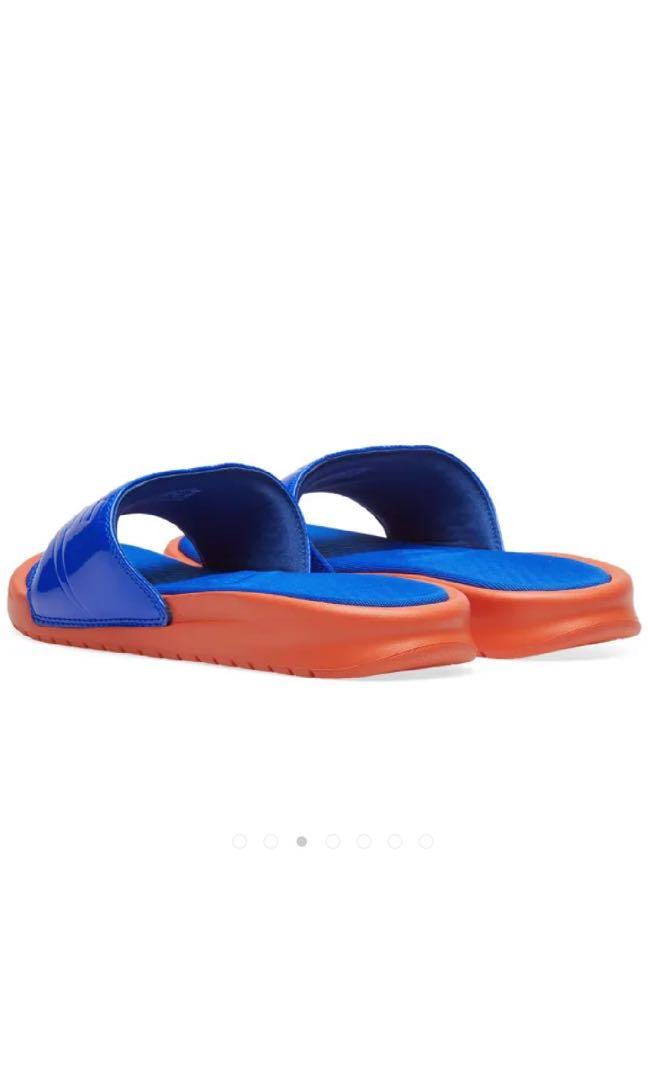 Blue and best sale orange nike slides