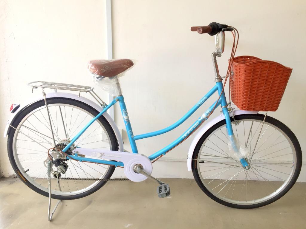 Blue vintage bike with basket outlet