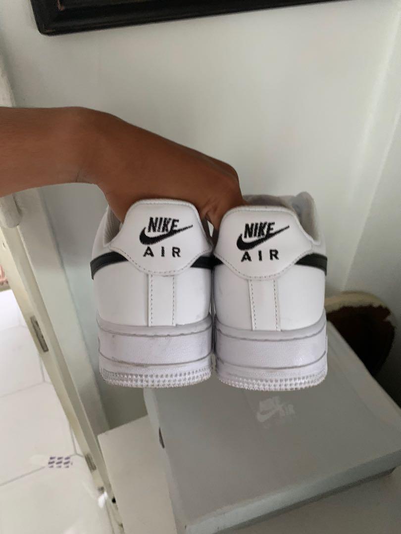 White nikes with black swoosh hot sale