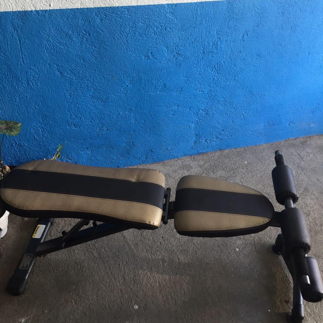 Bench, weights (60lbs), pull-up bar/gym (Category: Weights & Dumbbells) located in Makati City. Submitted by aja4817 (Listing ID 1057657689, Image 2). Description: Very good condition bench and weights with 60lbs weights and brand new still in the box pull-up bar/gym which you can do leg raises and use for triceps and other exercises. Open to meetups but would prefer pickup or through delivery service of your choice..