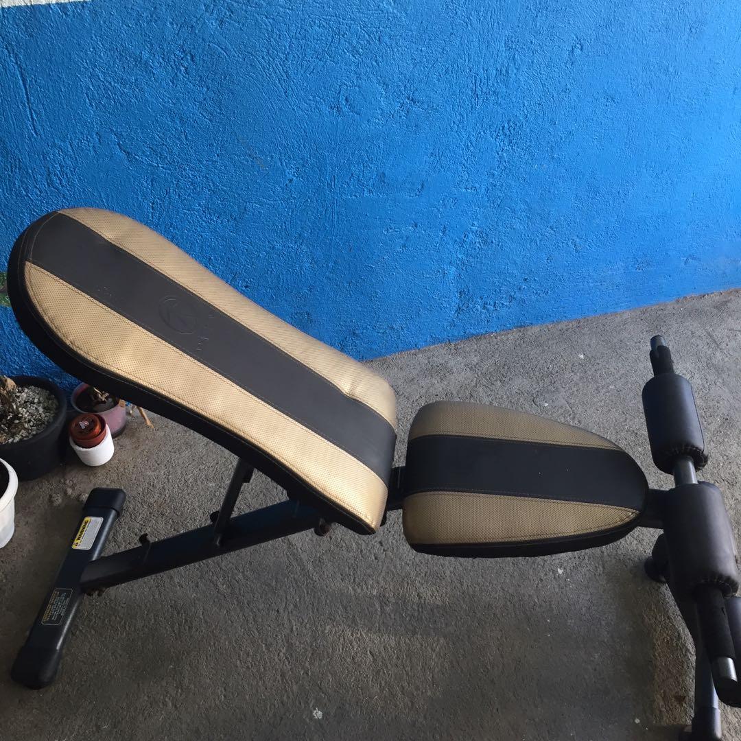 Bench, weights (60lbs), pull-up bar/gym (Category: Weights & Dumbbells) located in Makati City. Submitted by aja4817 (Listing ID 1057657689, Image 3). Description: Very good condition bench and weights with 60lbs weights and brand new still in the box pull-up bar/gym which you can do leg raises and use for triceps and other exercises. Open to meetups but would prefer pickup or through delivery service of your choice..