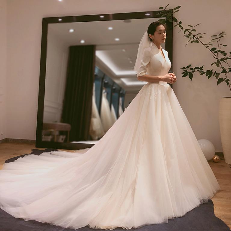 White satin long sleeve wedding dress shop