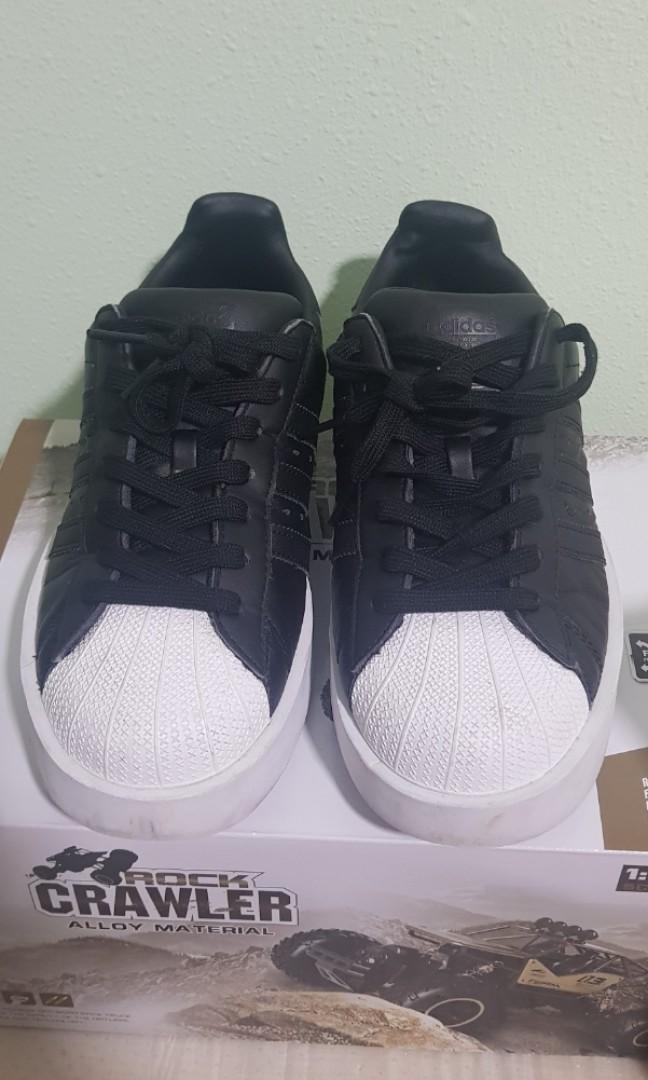 superstar black size 9