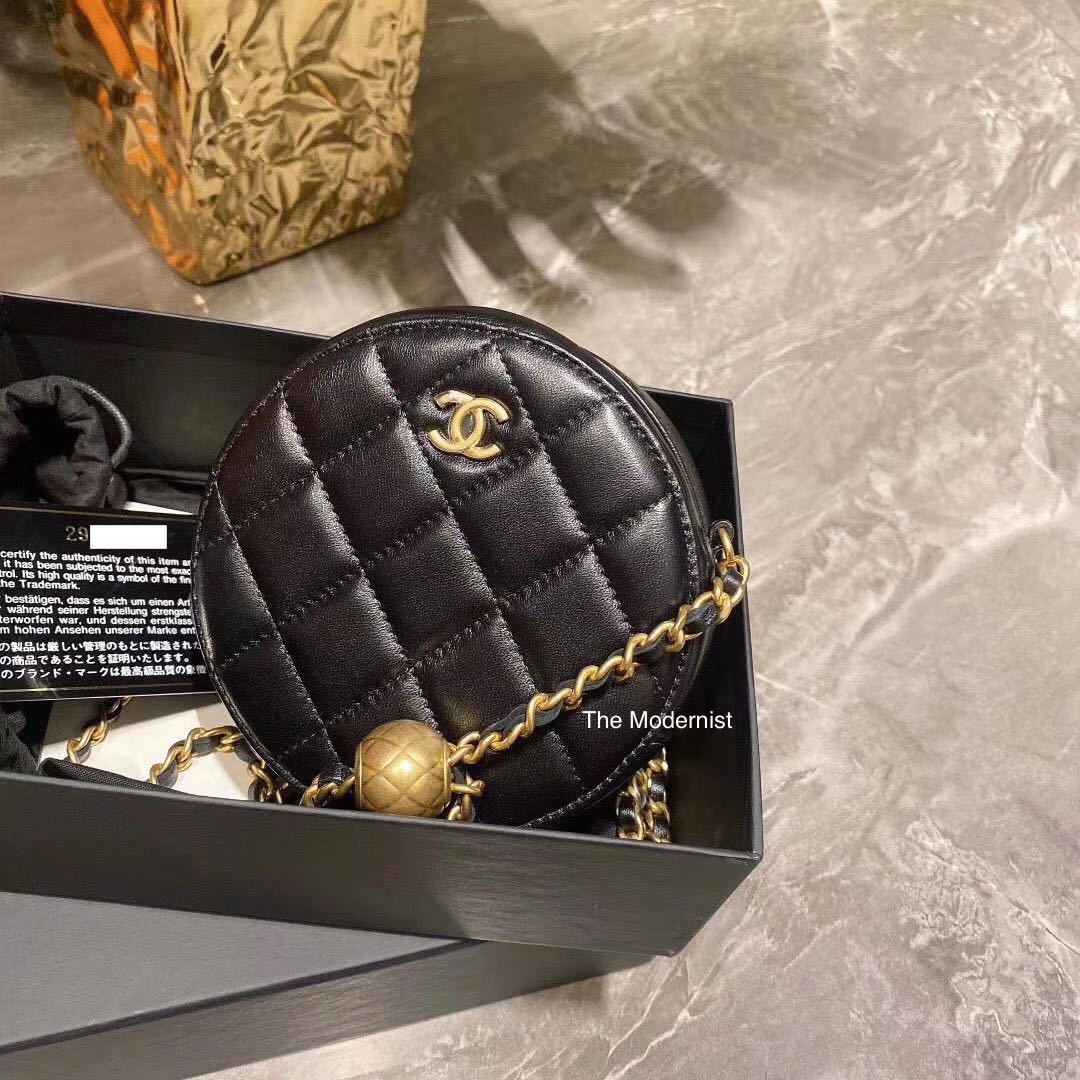 Chanel round clutch with top chain