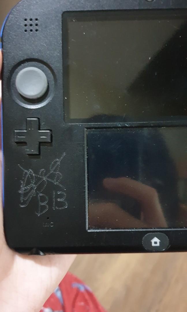Black with blue design 2ds( nintendo ds) (Category: Nintendo) located in Quezon City. Submitted by itemsforadoption (Listing ID 1057911309, Image 3). Description: Rfs: Coming back from my quarantine break to post more items to sell. I'll probably post more than 50 items over the course of these few days. Item Description: Black with blue sides 3ds *has a lot of markings and scratches but all functions work( unit only, has no charger, memory or st
