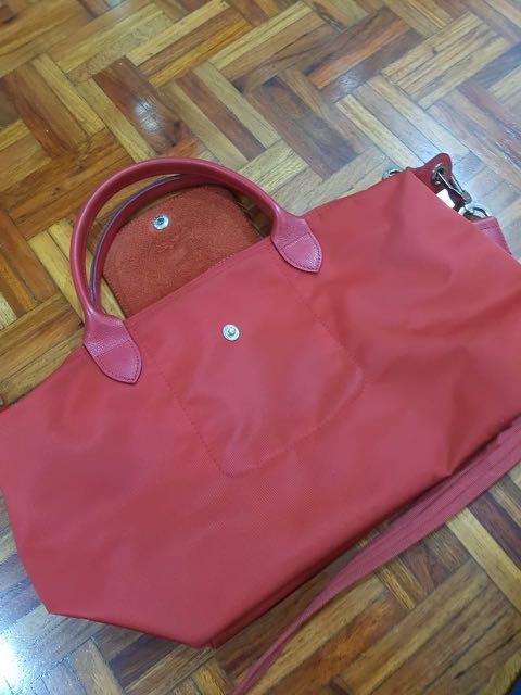 Preloved Longchamp Sling (Category: Luxury Bags & Wallets) located in Manila. Submitted by irockmysocks_ogee (Listing ID 1057761205, Image 1). Description: .