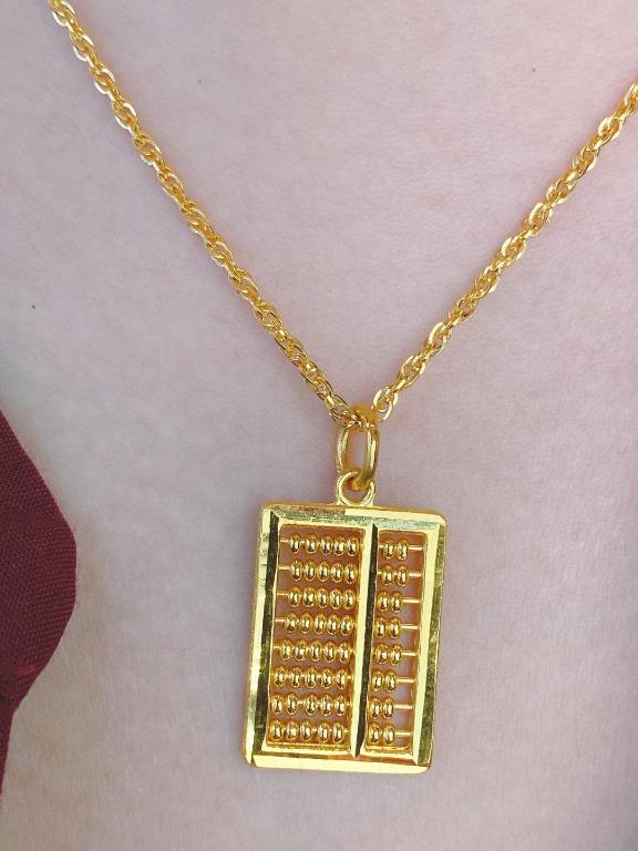 Abacus shop gold locket